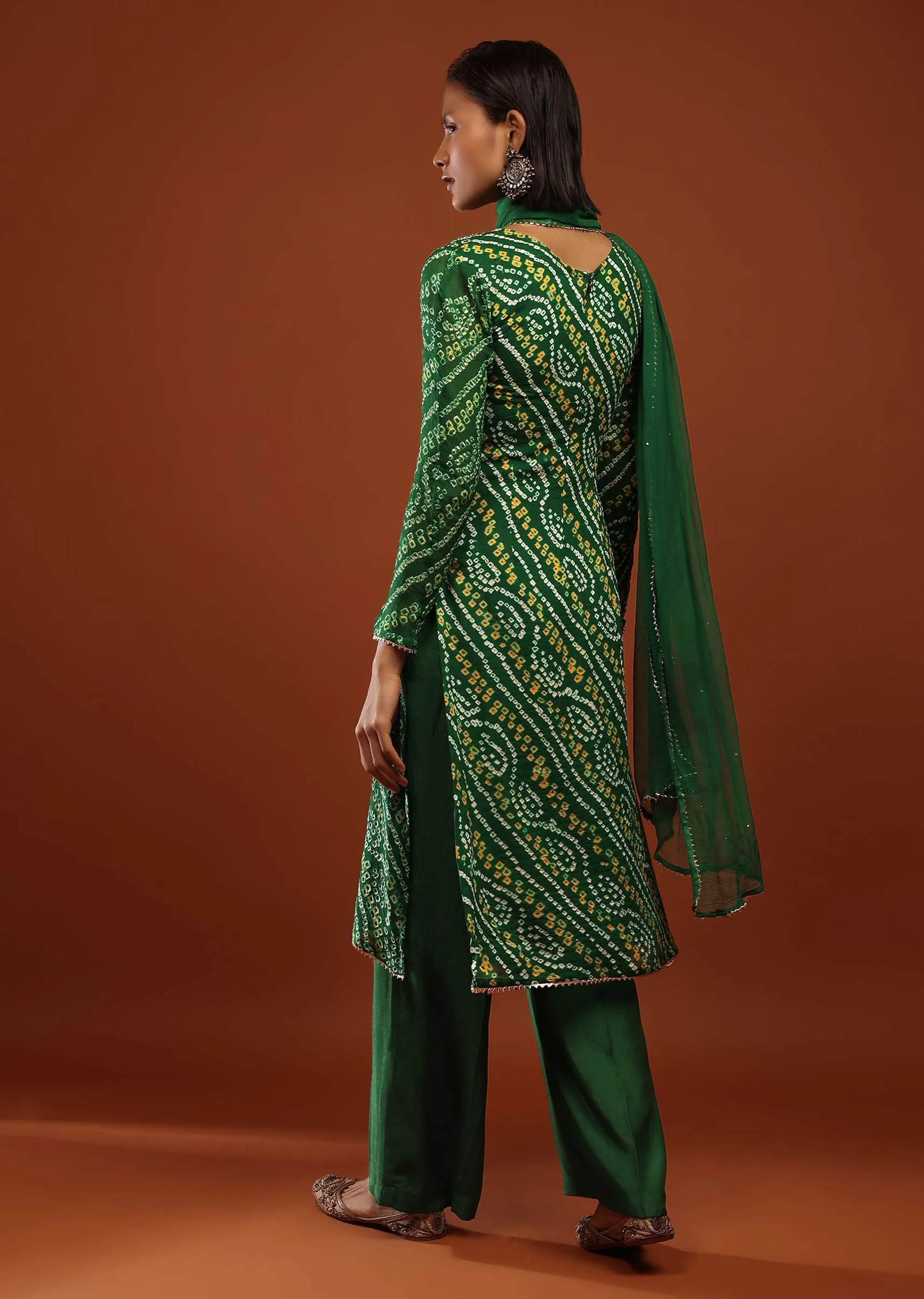 Bottle Green Straight Cut Suit In Georgette With Bandhani Print And Gotta Embroidered Yoke