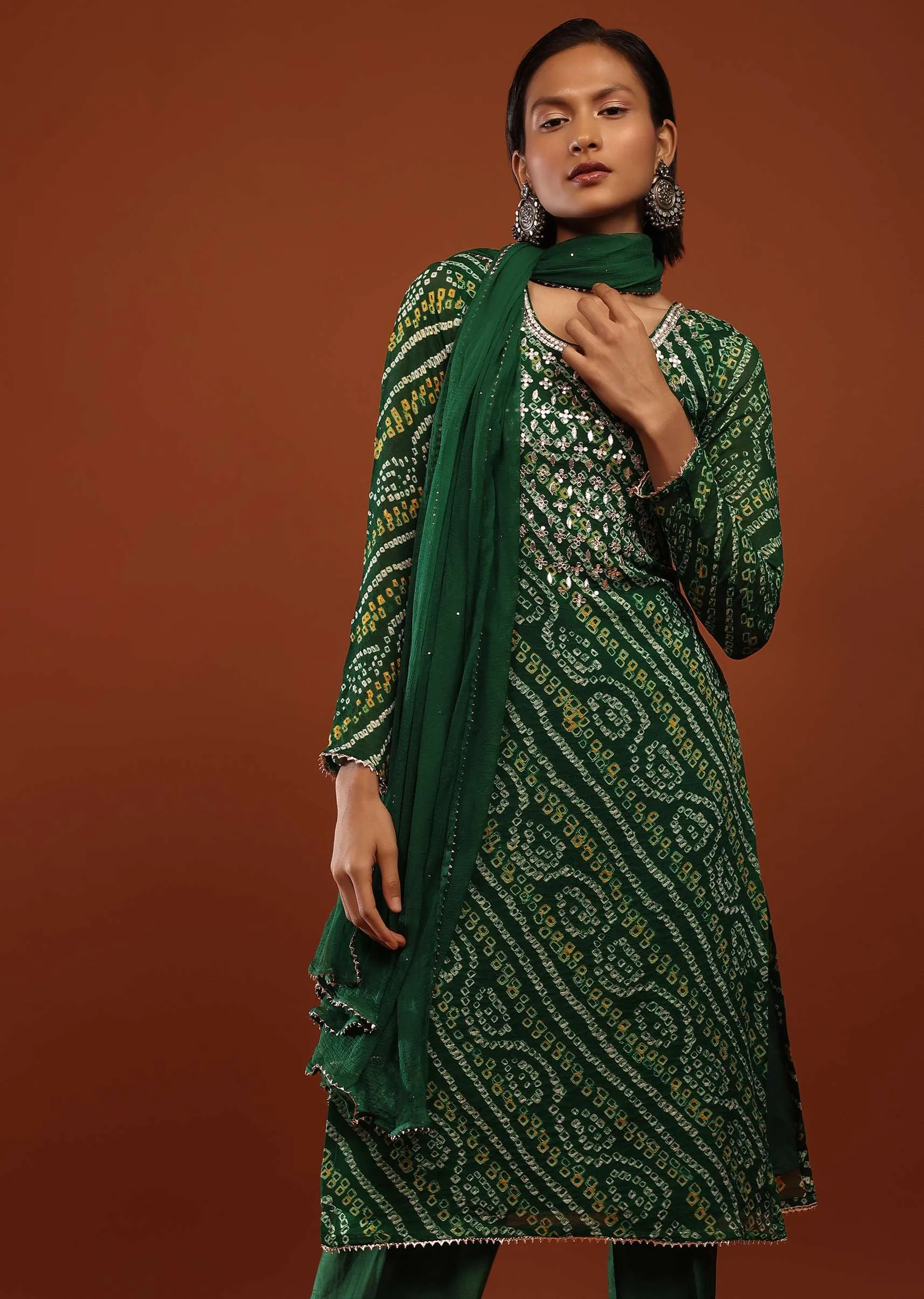 Bottle Green Straight Cut Suit In Georgette With Bandhani Print And Gotta Embroidered Yoke