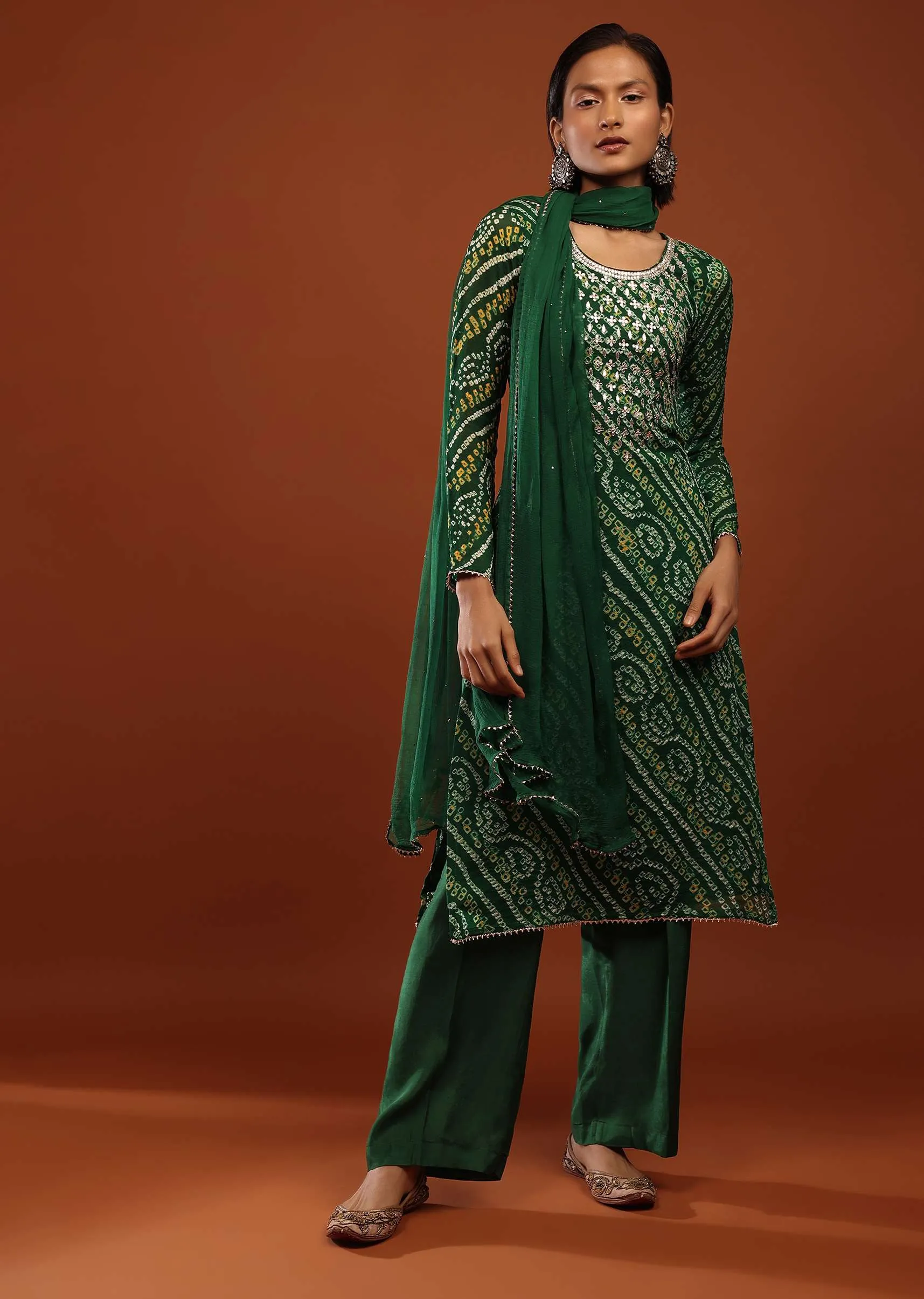 Bottle Green Straight Cut Suit In Georgette With Bandhani Print And Gotta Embroidered Yoke